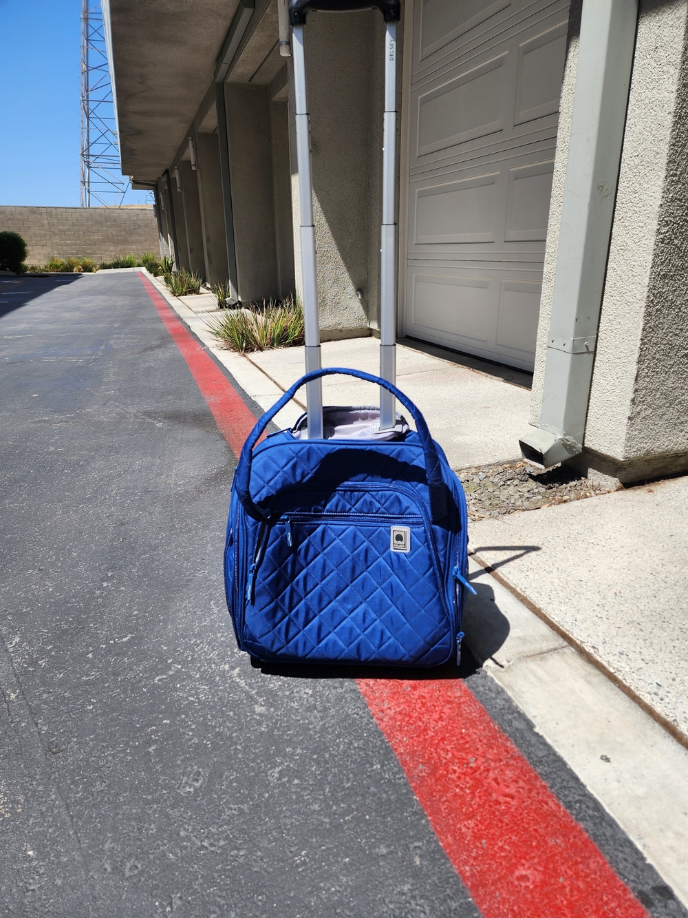 Delsey Paris Blue Quilted Rolling Travel Carry On  Bag -Underseater